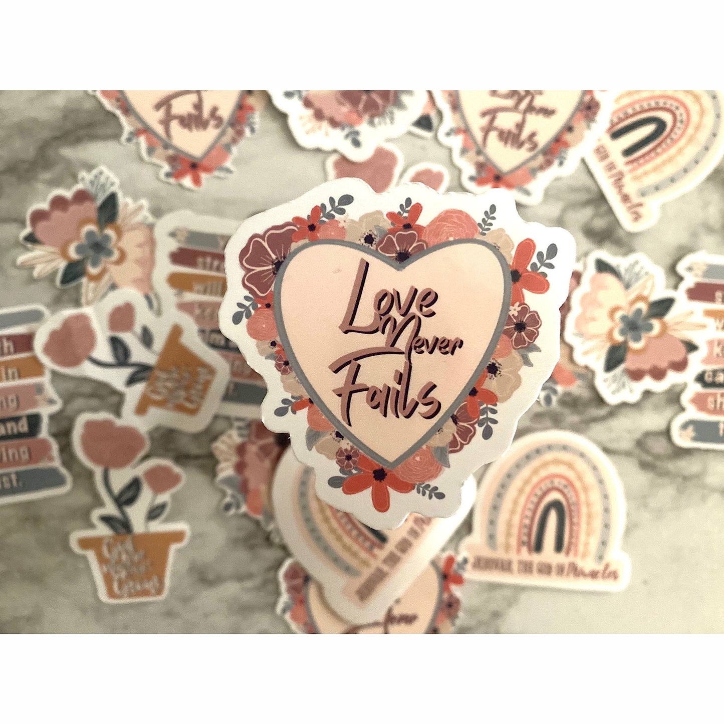 Love Never Fails Sticker
